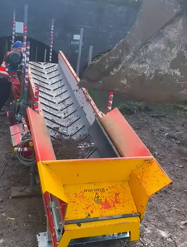 Engineering Excellence: Watch Our Conveyor System Transport Rubble Underneath A Small Bridge!